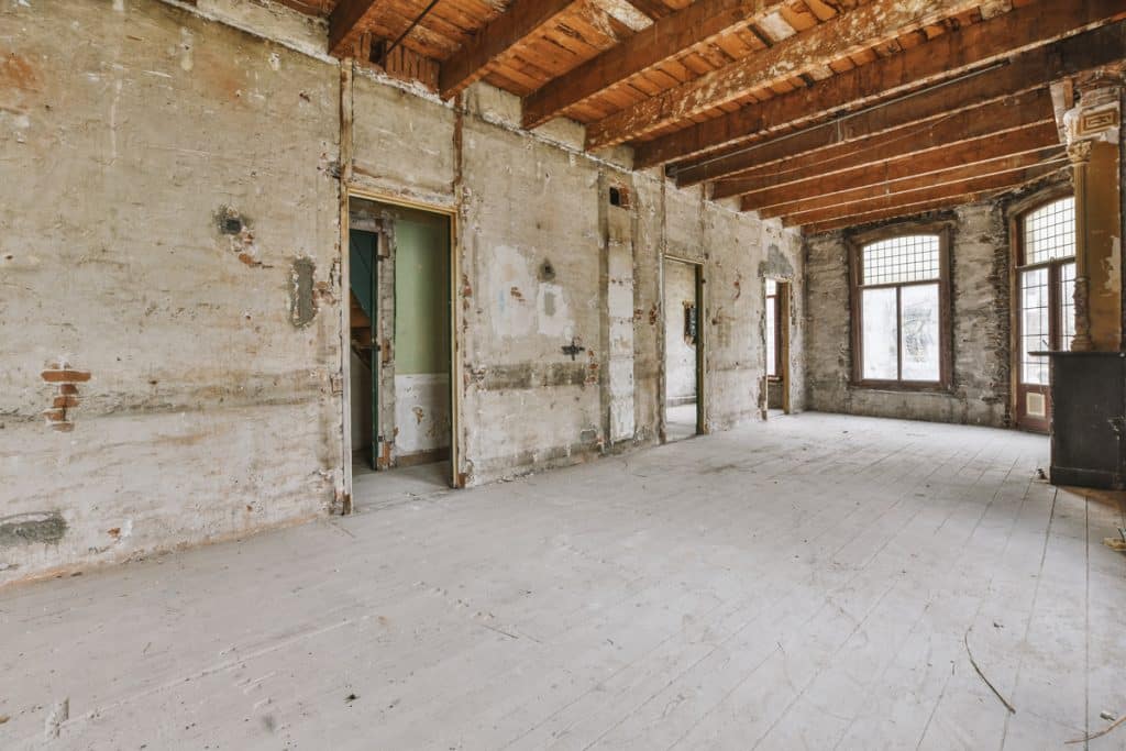 An empty room in need of renovation